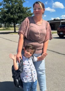 Kahllie a resident of OBHC The Vine with her son