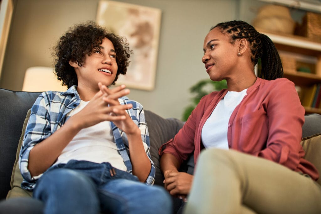 Boy visiting with mom about issues at school