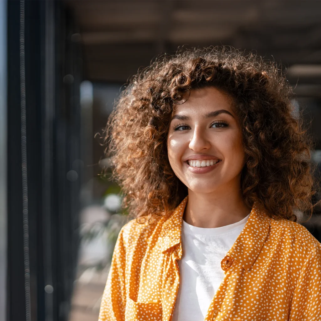 young woman feeling positive about her pregnancy in oklahoma