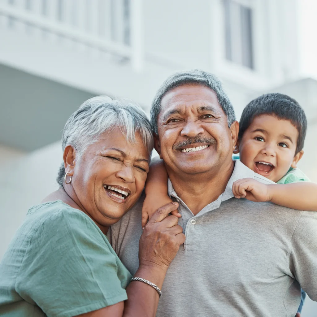happy grandparents with their grandson