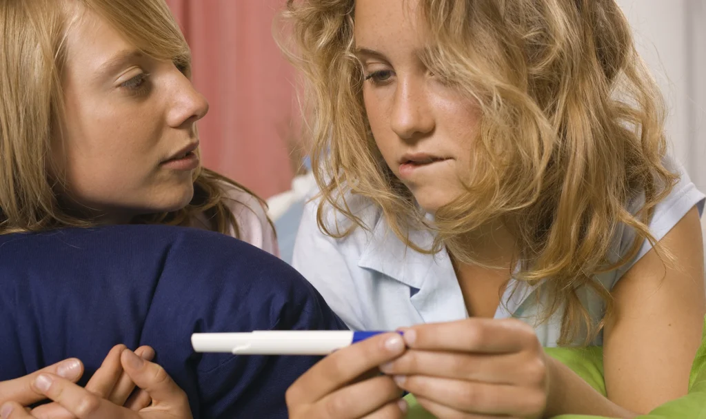 Worried teen about unplanned pregnancy seeking help